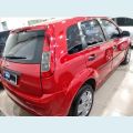 FORD FIESTA 1.0 ROCAM HATCH 8V FLEX 4P - VERMELHO - 2013 Foto 4 (Miniatura)