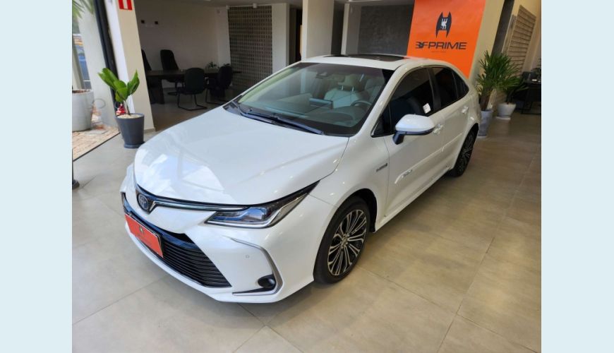 TOYOTA COROLLA 1.8 VVT-I HYBRID FLEX ALTIS PREMIUM CVT - BRANCO - 2022 Foto 1 (Grande)