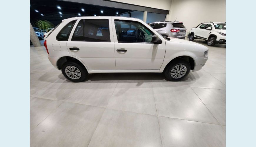 VOLKSWAGEN GOL 1.0 MI 8V FLEX 4P MANUAL G.IV - BRANCO - 2014 Foto 4 (Grande)