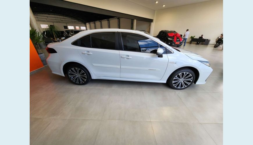 TOYOTA COROLLA 1.8 VVT-I HYBRID FLEX ALTIS PREMIUM CVT - BRANCO - 2022 Foto 4 (Grande)