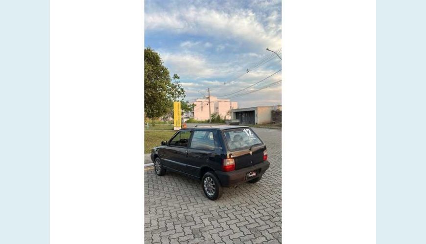 FIAT UNO MILLE FIRE ECONOMY 1.0 FLEX 4P - AZUL - 2012 Foto 4 (Grande)
