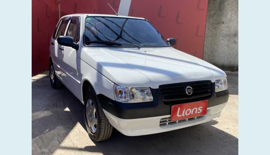 FIAT UNO MILLE FIRE ECONOMY 1.0 FLEX MANUAL 3P - BRANCO - 2013 Foto 4 (Grande)